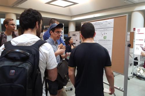 Physics/PEB student presenting his Integrated Workshop project on the optimization of a microfluidic device used to single-cell trapping at the 2016 iPoLS meeting..